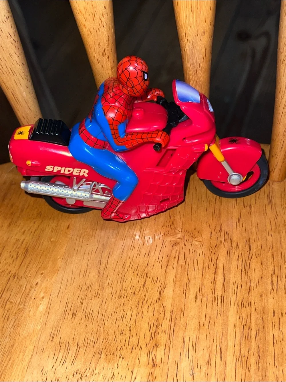 This is a Vintage 1995 Toy Biz Spider-Man Motorized Wheelie Cycle